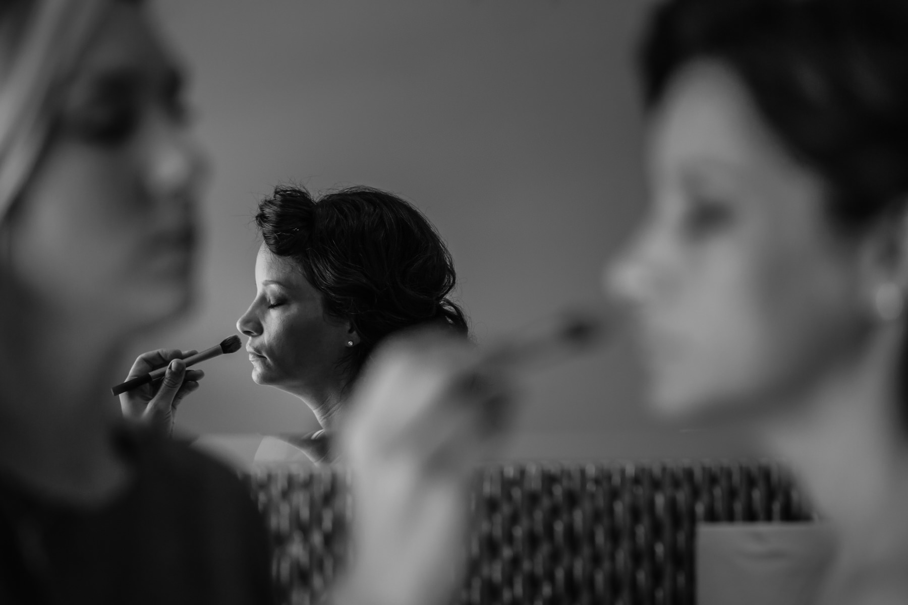 bride gets makeup at Bear Brook Valley