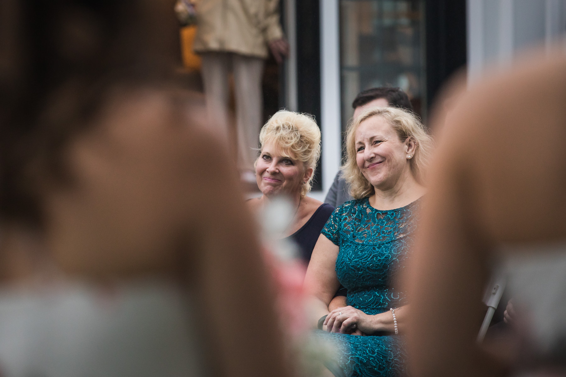 Proud mother of the groom looks on lovingly at Stone Rows Farm Wedding, Stockton, NJ