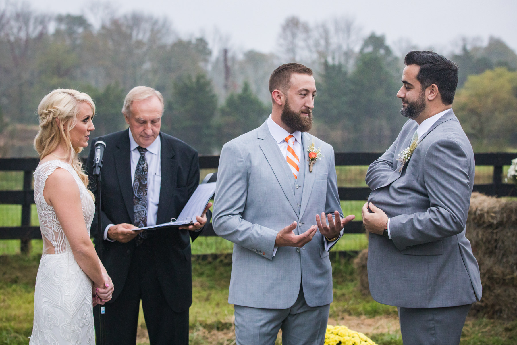 groom patiently waits for the wedding rings at Stone Rows Farm Wedding, Stockton, NJ