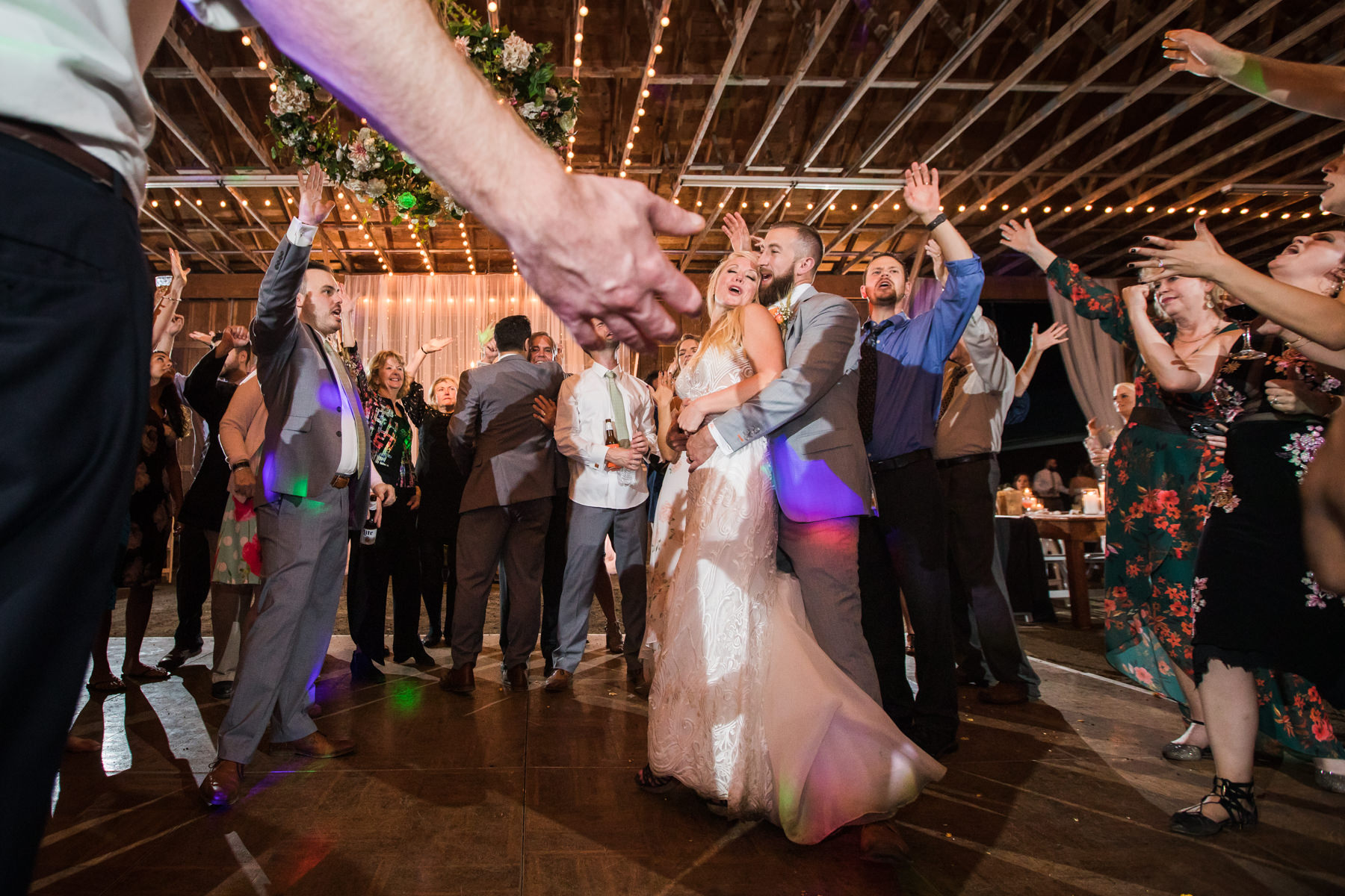 Bride and groom dancing at their wedding reception, at their rustic farm wedding in Stockton, NJ