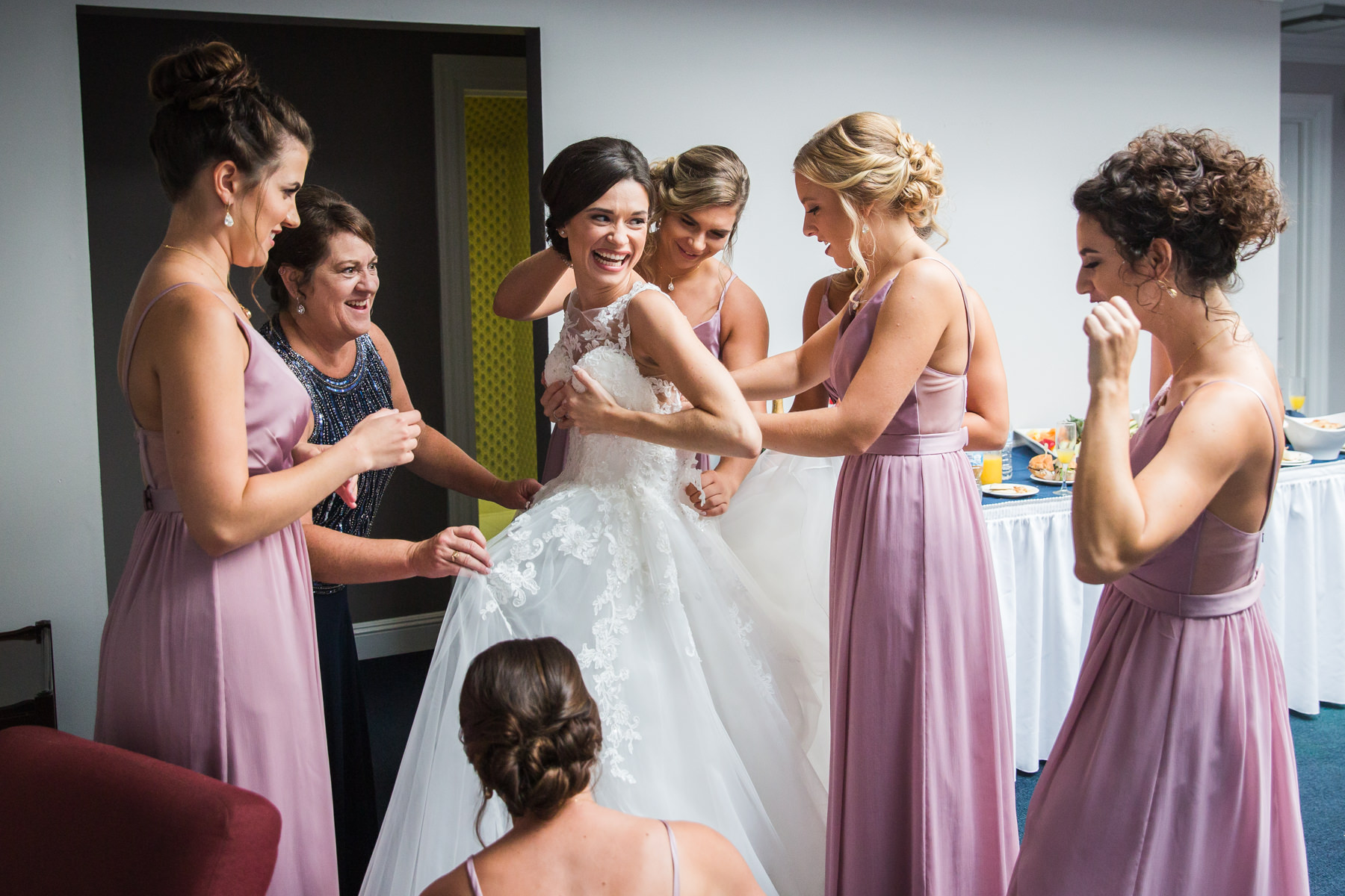 Bride gets dressed at Beaver Brook Country Club Wedding