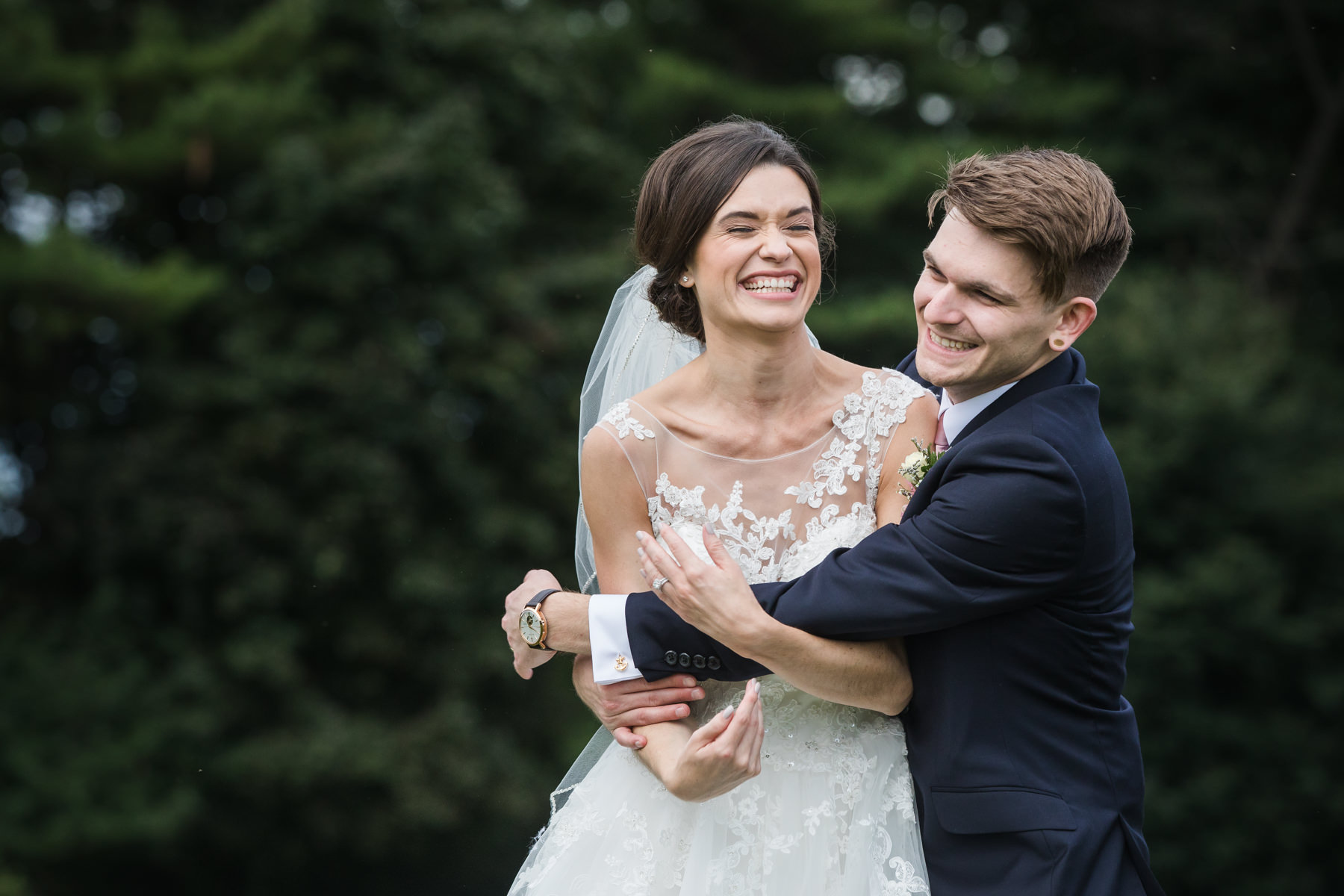 Playful bride and groom portrait at Beaver Brook Country Club Wedding