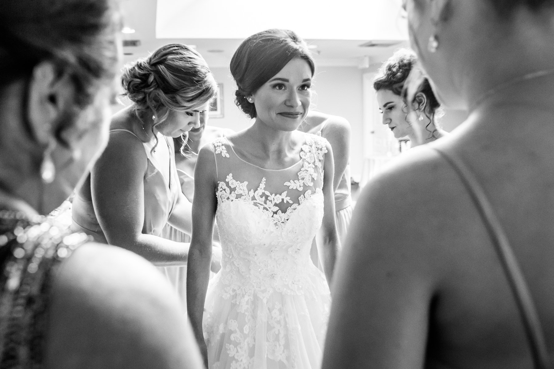 Bride gets dressed at Beaver Brook Country Club Wedding