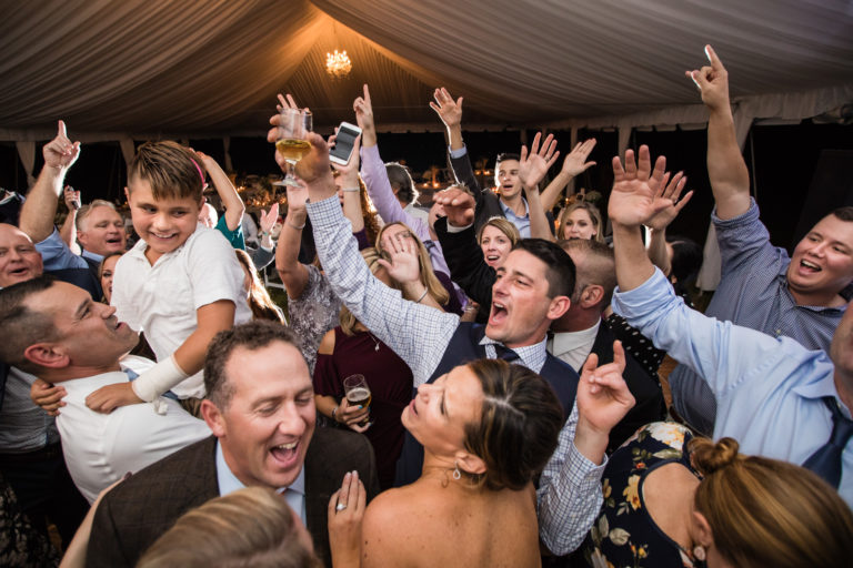 Crazy dance and singing party at wedding reception